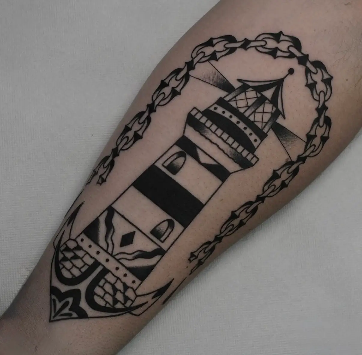 Traditionelles Leuchtturm Tattoo
